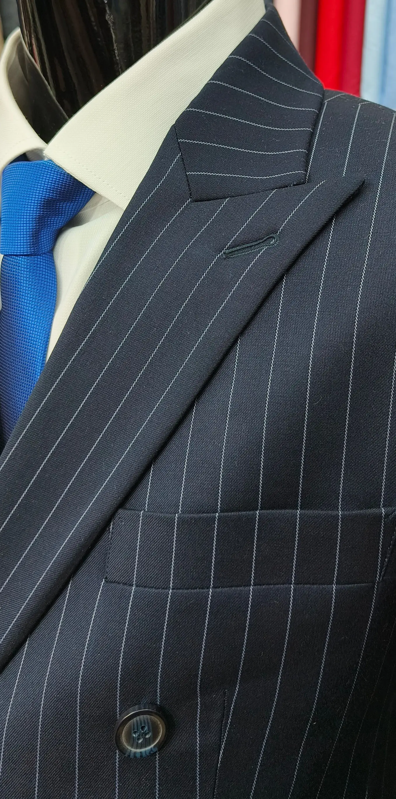 Notched lapel detail on a bespoke suit jacket