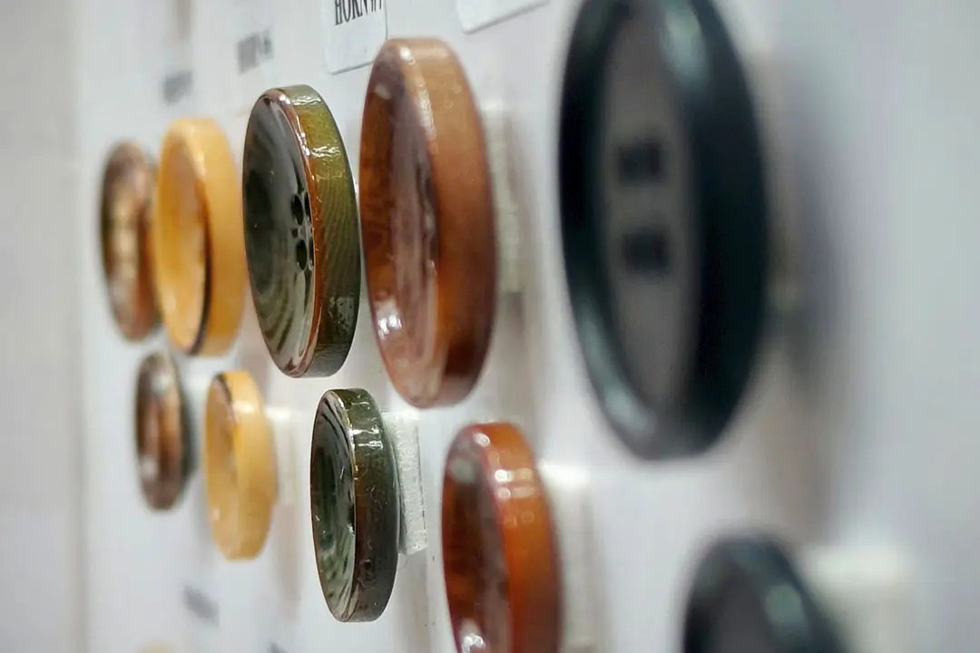 Close-up of jacket buttons
